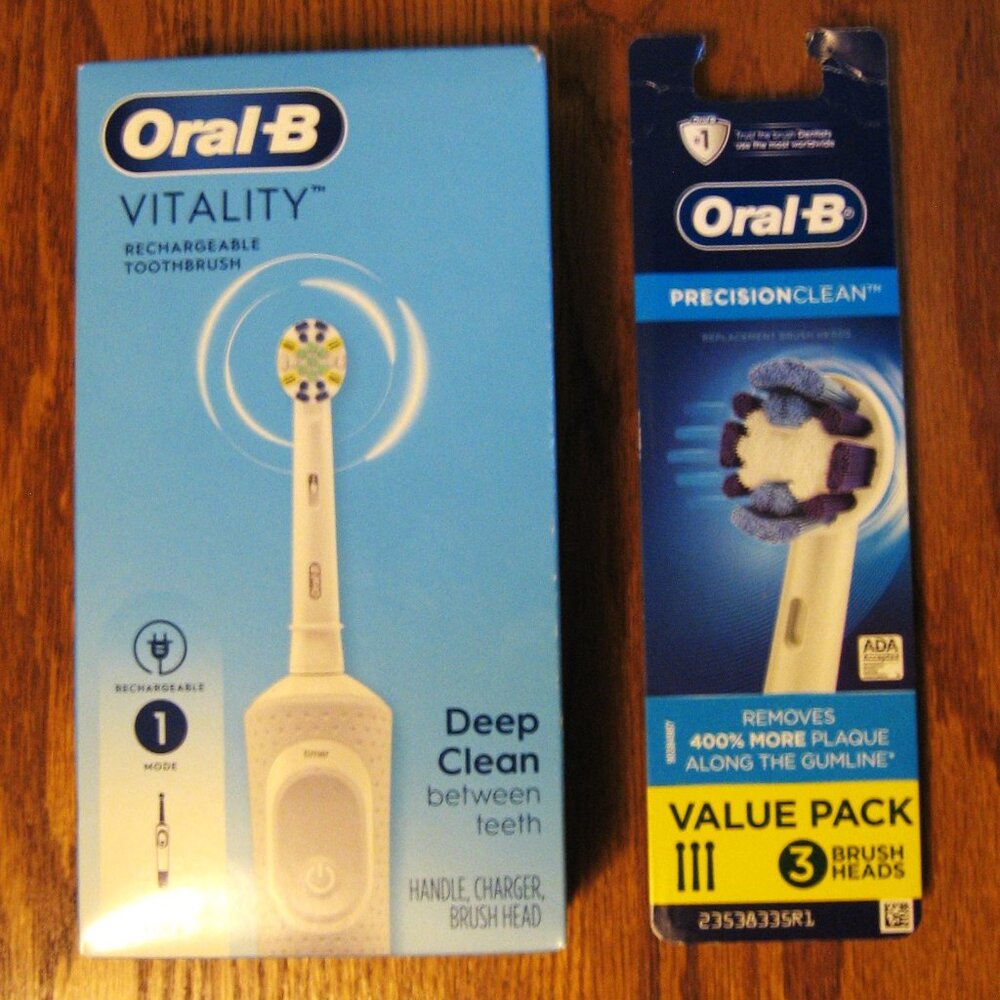 Oral B Vitality Rechargeable Toothbrush with 3 Interchangeable brush heads